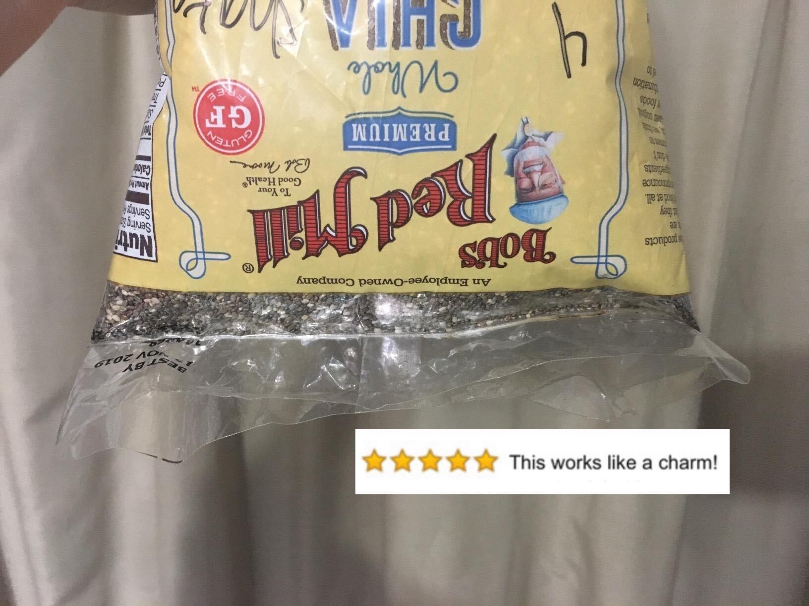 A reviewer photo of a bag of chia seeds sealed and turned upside down