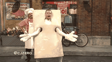 a gif of Justin Timberlake in a tofu costume dancing