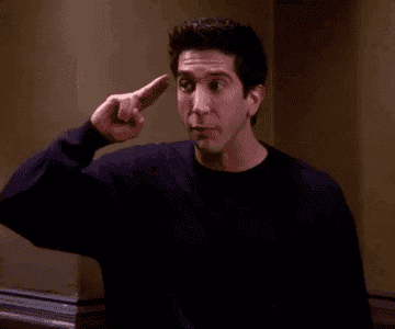 ross putting his fingers to his head and saying unagi