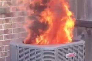 An air conditioner on fire, spurting flames