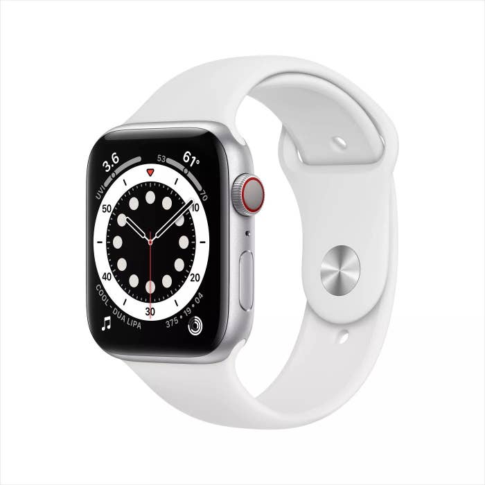 The Apple watch with a rectangular face on a white strap
