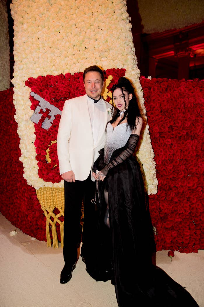 Wearing a tuxedo and a gown, Elon Musk and Grimes attend the Heavenly Bodies: Fashion &amp;amp; The Catholic Imagination Costume Institute Gala at the Metropolitan Museum in May 2018, in New York City