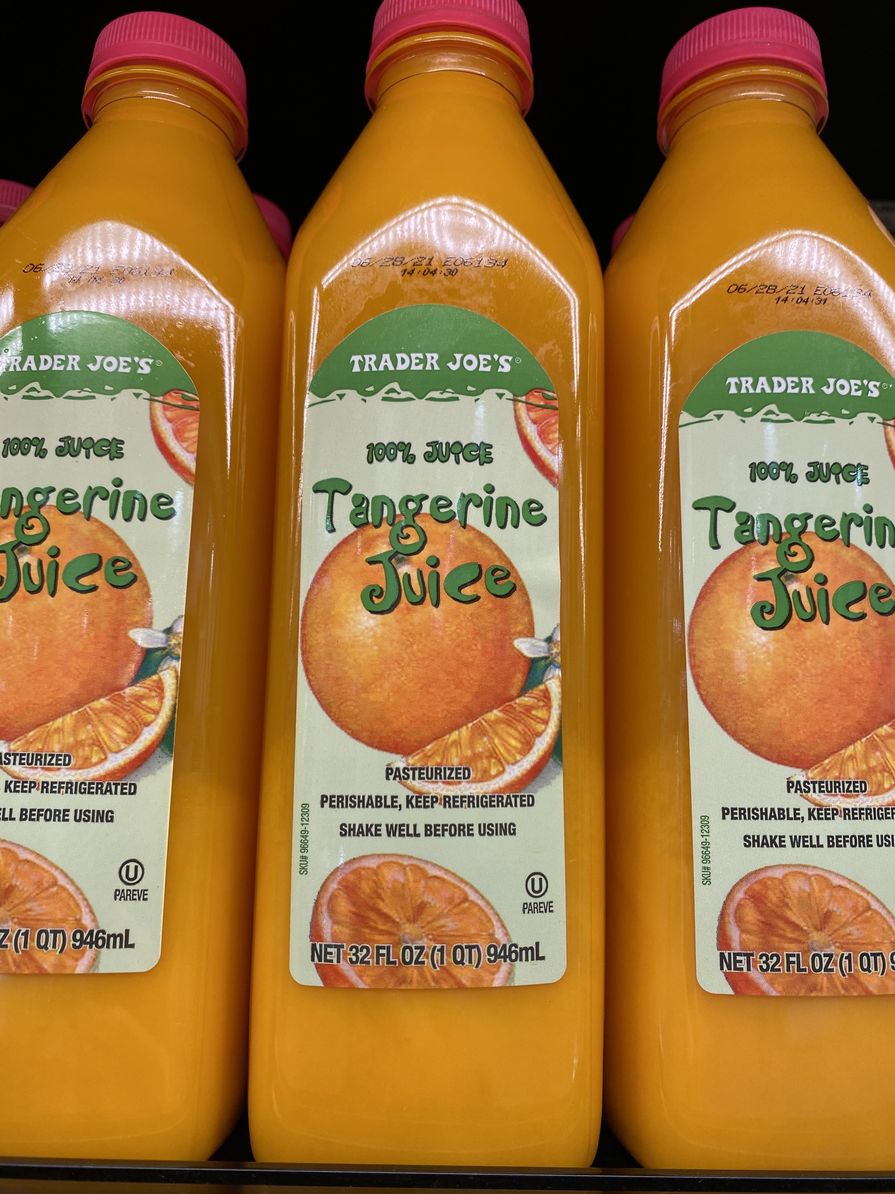 Bottles of Trader Joe&#x27;s tangerine juice.