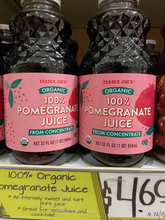 Two bottles of 100% Pomegranate Juice.