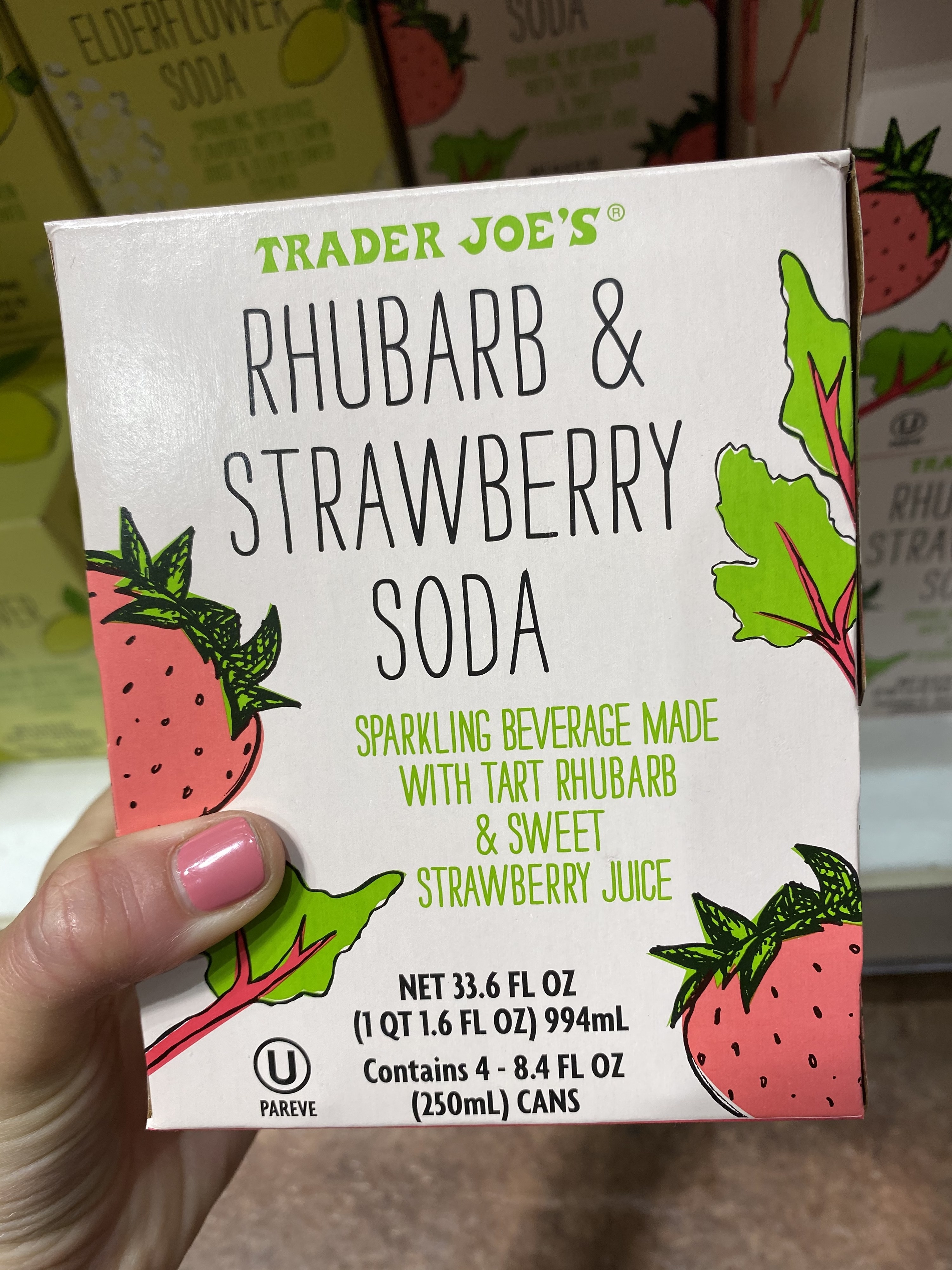 A box of Rhubarb &amp;amp; Strawberry Soda cans.