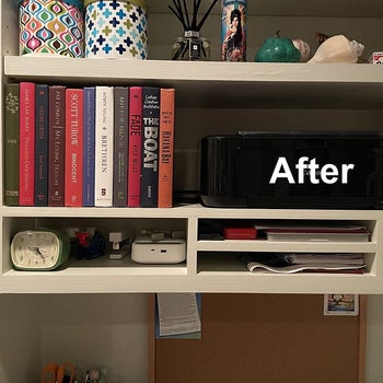 a reviewer photo of the same shelf with the book display covering the cords