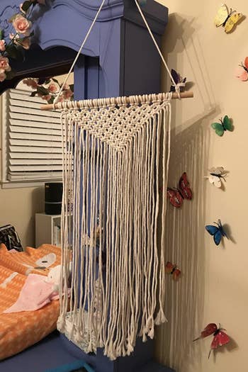 Reviewer's macrame wall hanging without any hair accessories yet