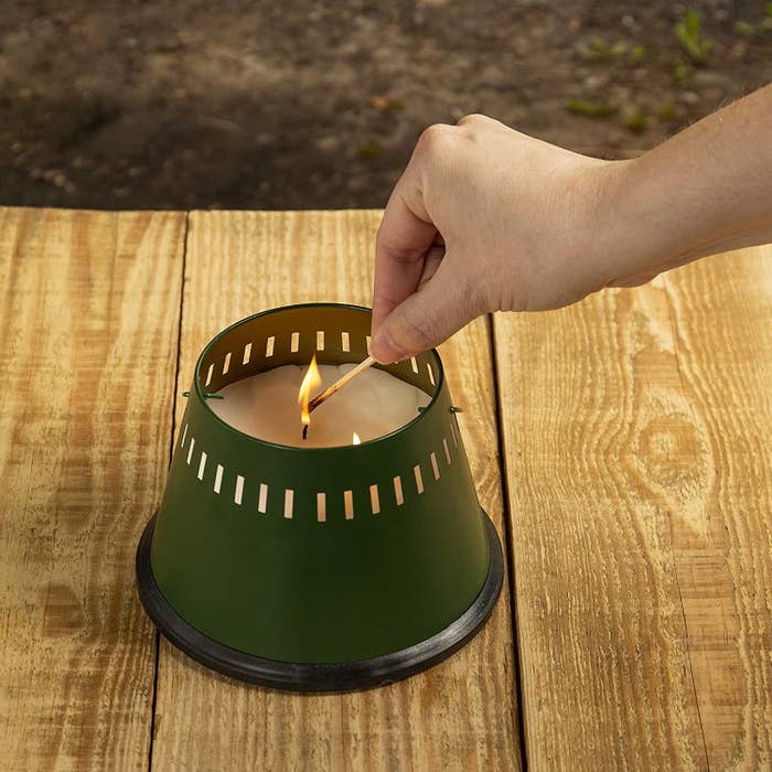 Model lighting candle with match