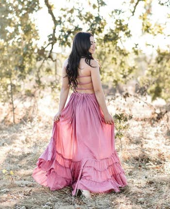 back view of a reviewer wearing the dress in pink