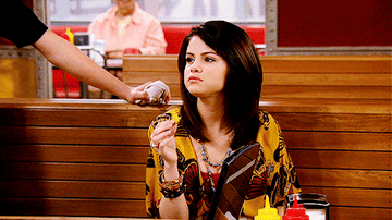 Alex Russo furrows her brows in surprise