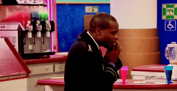 London and Mr. Moseby talk on their cell phones and turn to face one another
