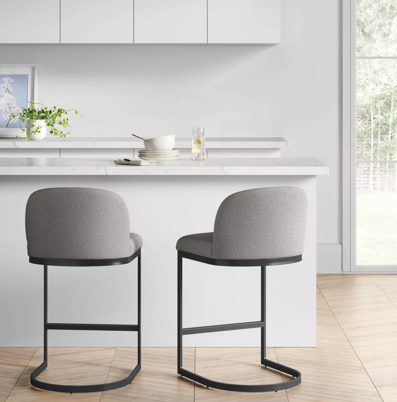 the stools next to a white counter