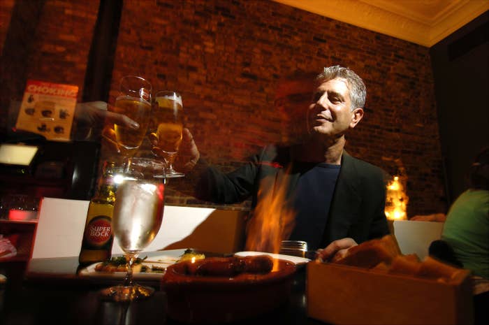 Chef Anthony Bourdain has a drink at Tintol restaurant in New York City's Times Square