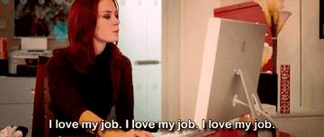 Gif of Emily Blunt in &quot;The Devil Wears Prada&quot; saying &quot;I love my job, I love my job, I love my job&quot;
