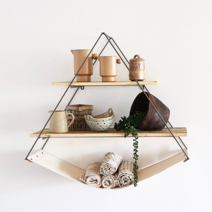 the triangle sling shelf mounted on a wall