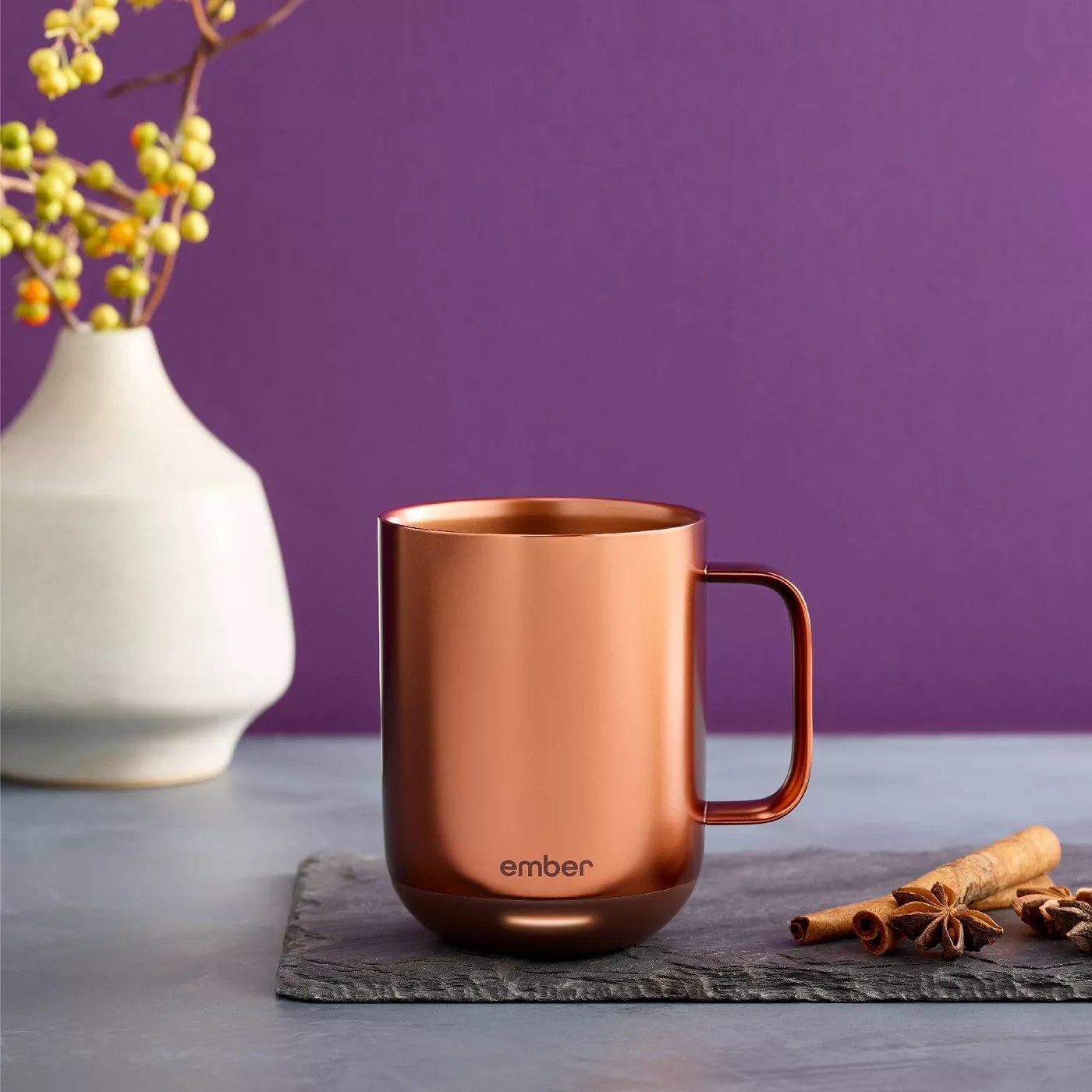 The copper mug with a matching handle on a counter