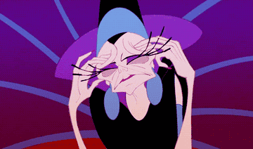 Yzma rubbing her temples