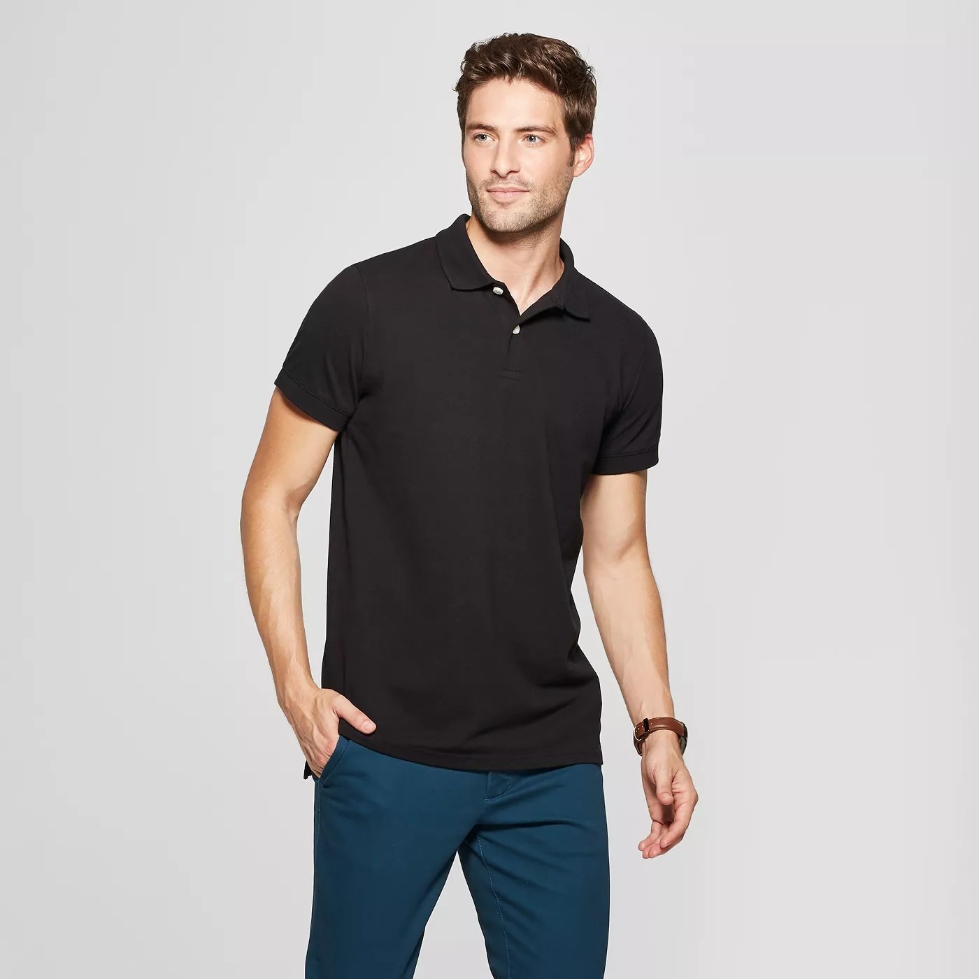 A model wearing the short sleeve shirt in black