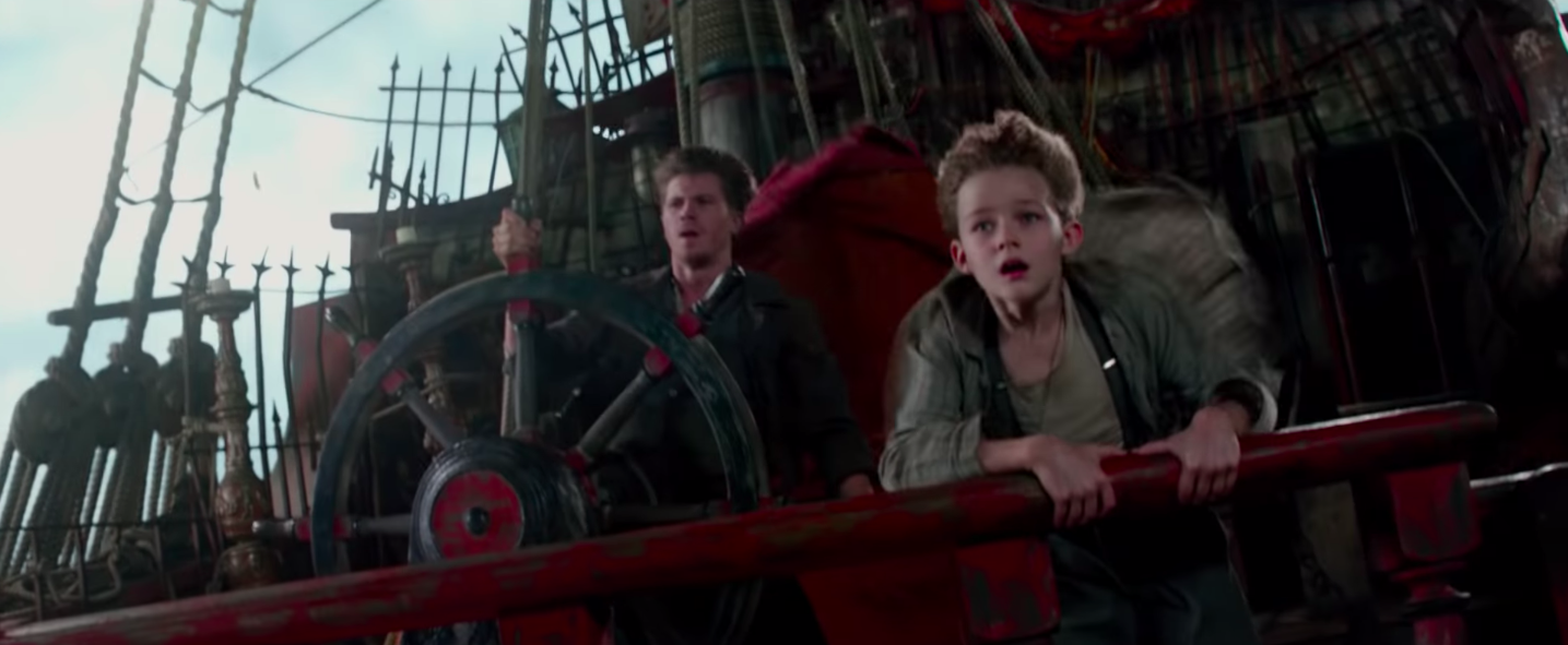 Hook and Peter looking worried on a boat Hook&#x27;s driving in &quot;Pan&quot;