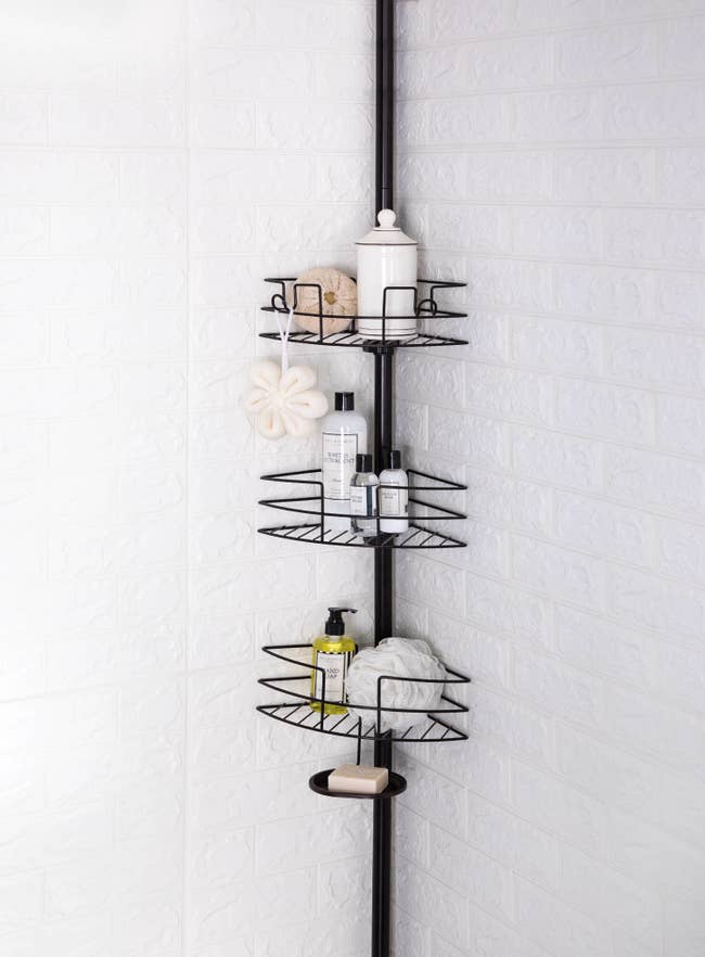 The three-tier shower caddy with an extension pole