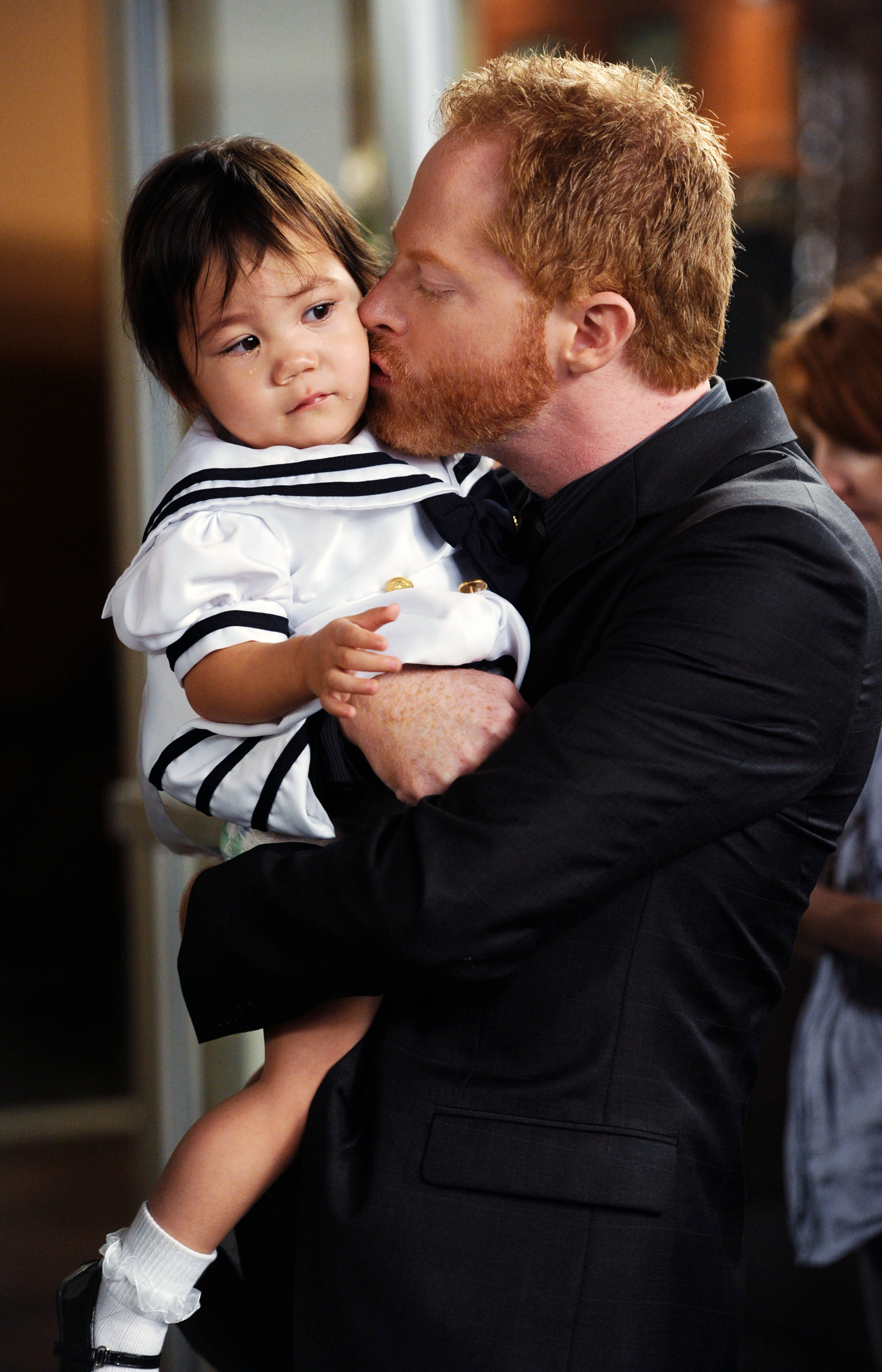 Michael holding and kissing Lily