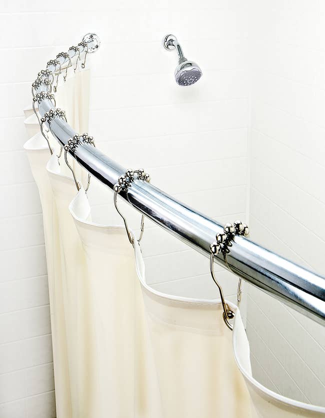 An adjustable shower curtain rod