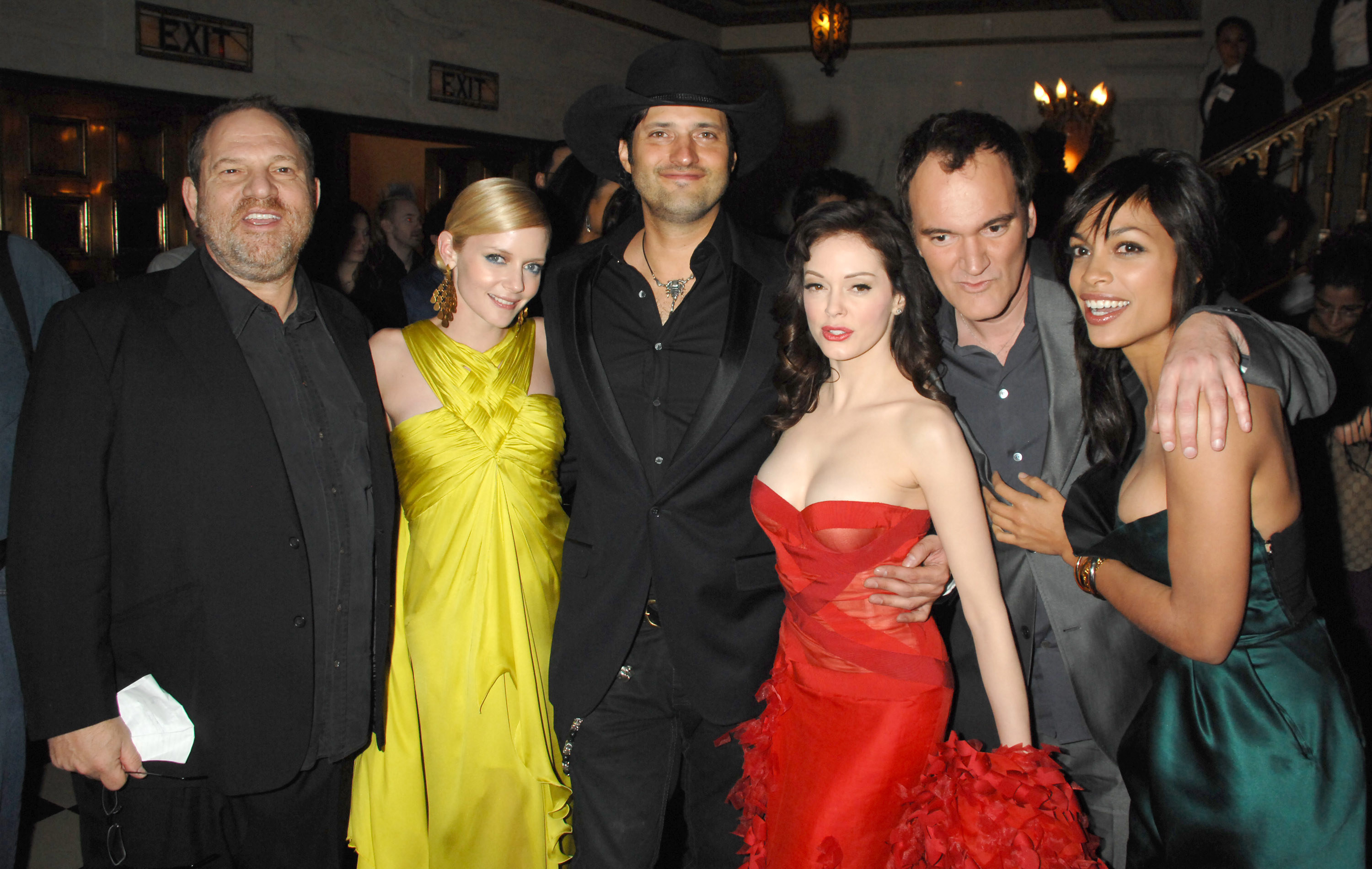 Harvey Weinstein, Marley Shelton, Robert Rodriguez, Rose McGowan, Quentin Tarantino and Rosario Dawson pose for a photo at a premiere