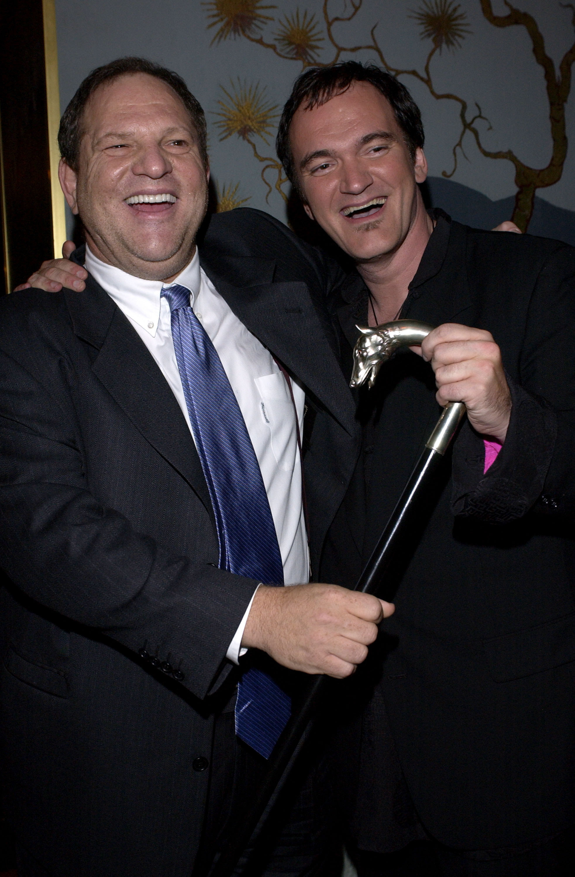 Weinstein and Tarantino enjoy a laugh together at a premiere