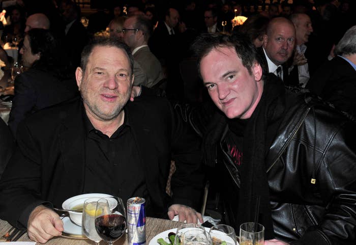 Harvey Weinstein and Quentin Tarantino sit next to each other over food and drinks in 2013