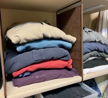 a reviewer photo of a shelf with the dividers installed 