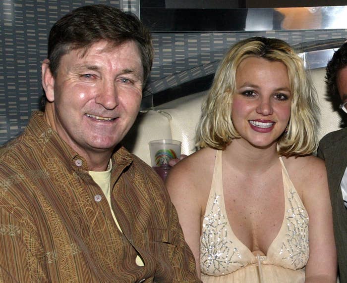 A young Britney sits next to her father