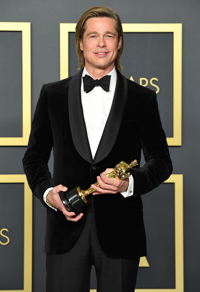 Pitt at the Academy Awards holding an Oscar