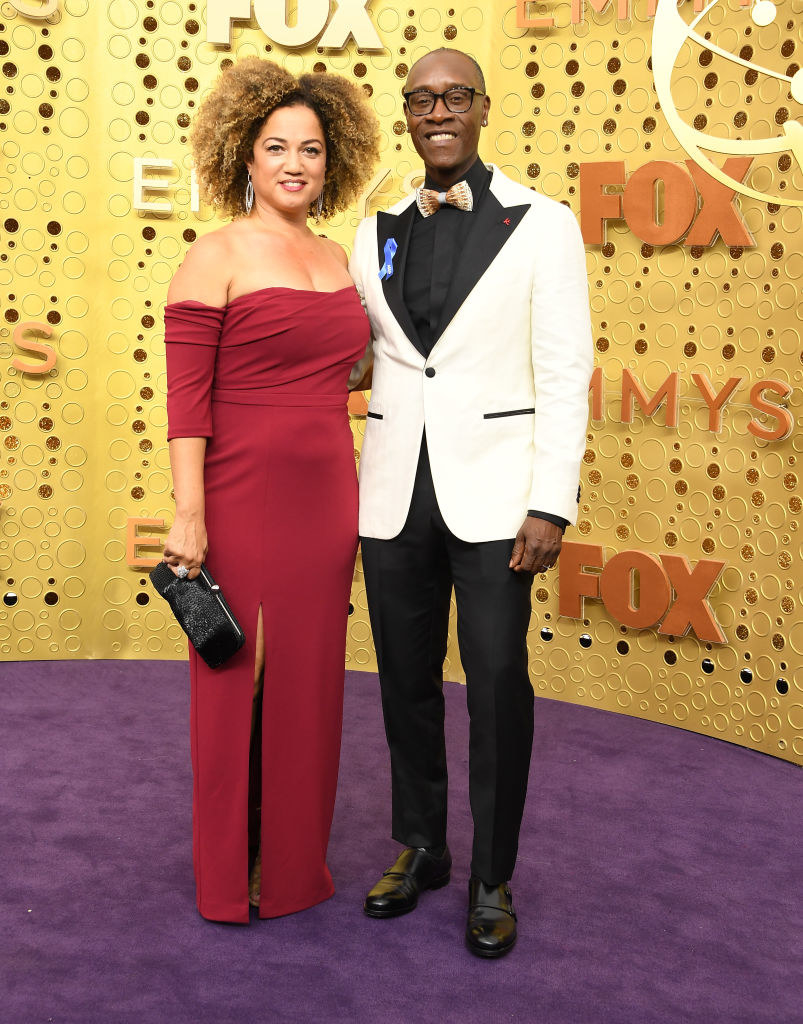 Bridgid Coulter (L) and Don Cheadle arrives at the 71st Emmy Awards