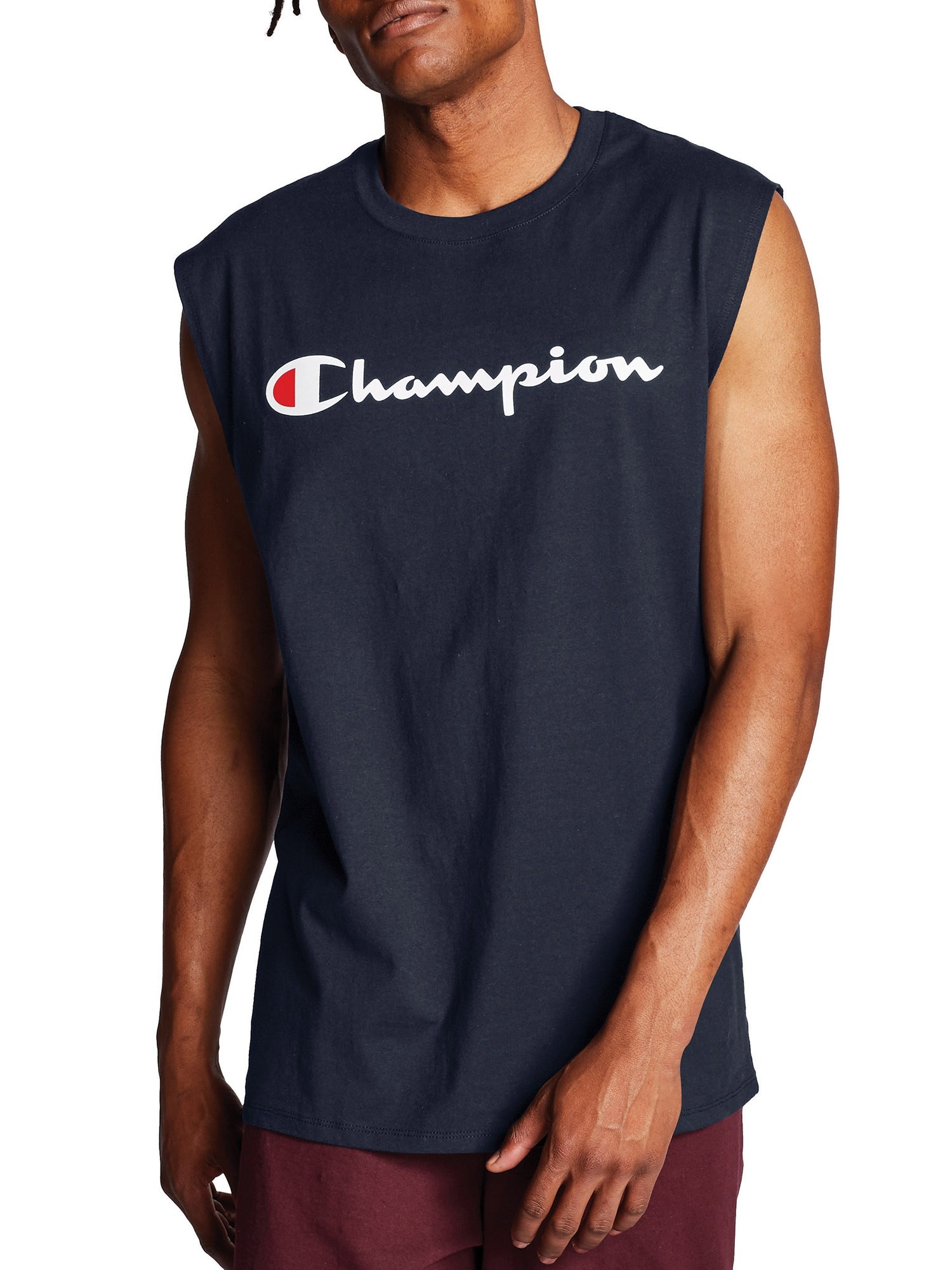 The black muscle tee says &quot;Champion&quot; in white script font