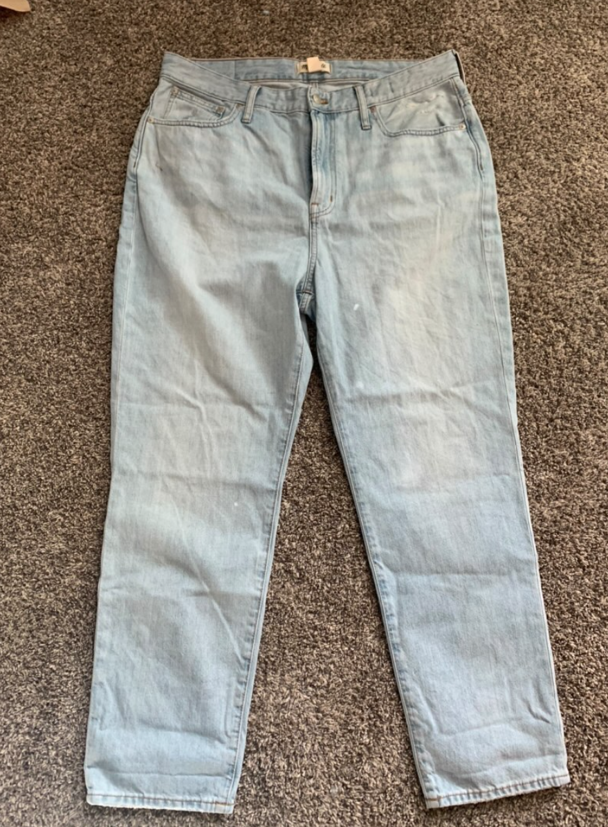 A pair of light wash jeans