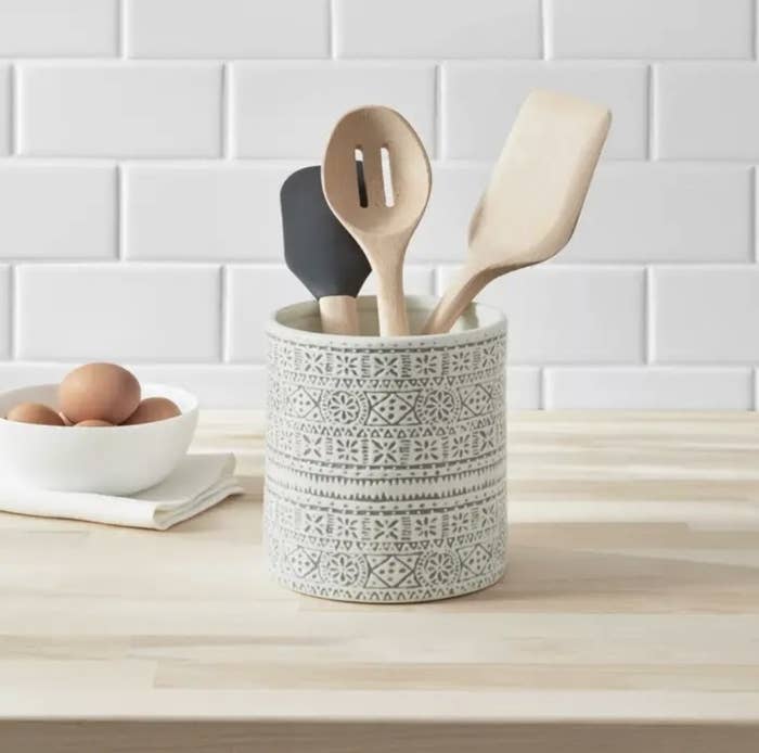 Utensil holder on kitchen counter