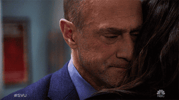 Stabler and Benson hugging, Stabler buries his face into her shoulder