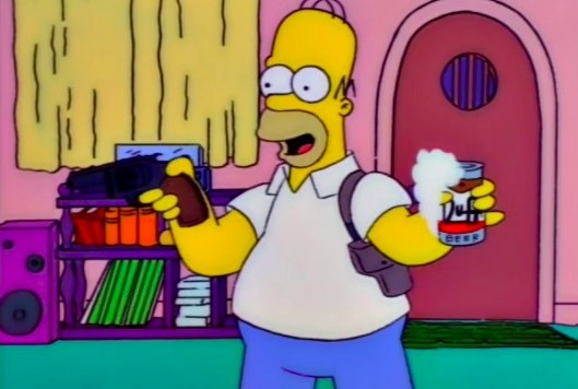 Homer holds a gun in one hand and a beer in another in the Simpsons