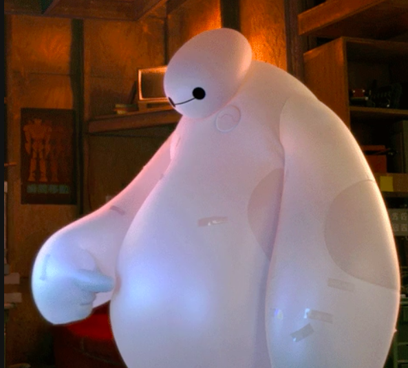 Her belly was fake like Baymax's inflated suit