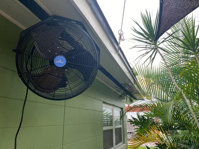 The fan hanging over a patio