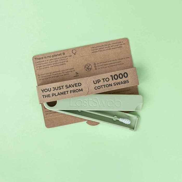 Reusable green swab with bumps on the tip in a green case that says "LastSwab"