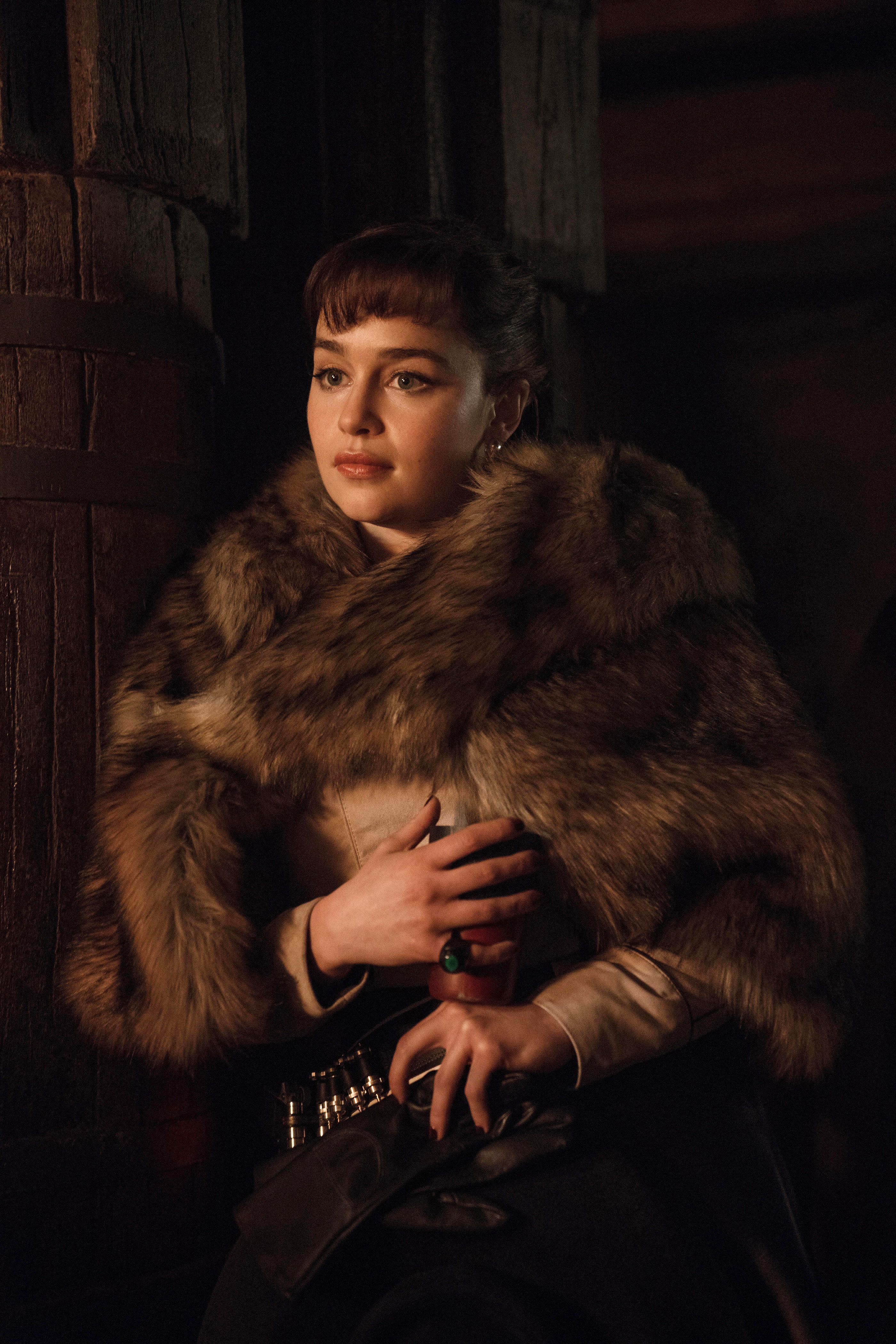 Emilia Clarke poses in fur as Qi&#x27;ra in &quot;Solo: A Star Wars Story&quot;