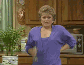 Gif of Rue McClanahan in &quot;The Golden Girls&quot; misting herself with a spray bottle