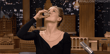 Rosamund pike taking a shot and saying that&#x27;s disgusting