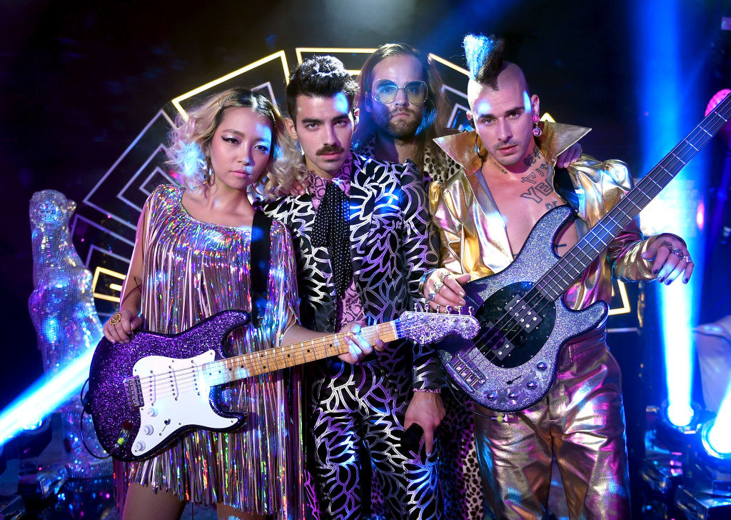 Joo Lee, Joe Jonas, Jack Lawless and Cole Whittle of DNCE perform during a pre-taping for the 2017 MTV Video Music Awards at the Palms Casino Resort