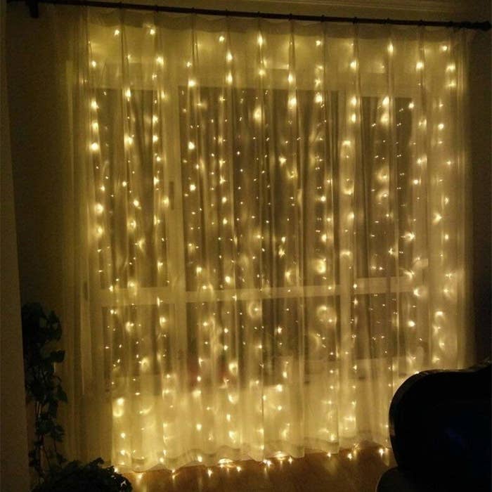 A curtain with a string of LED lights on it 