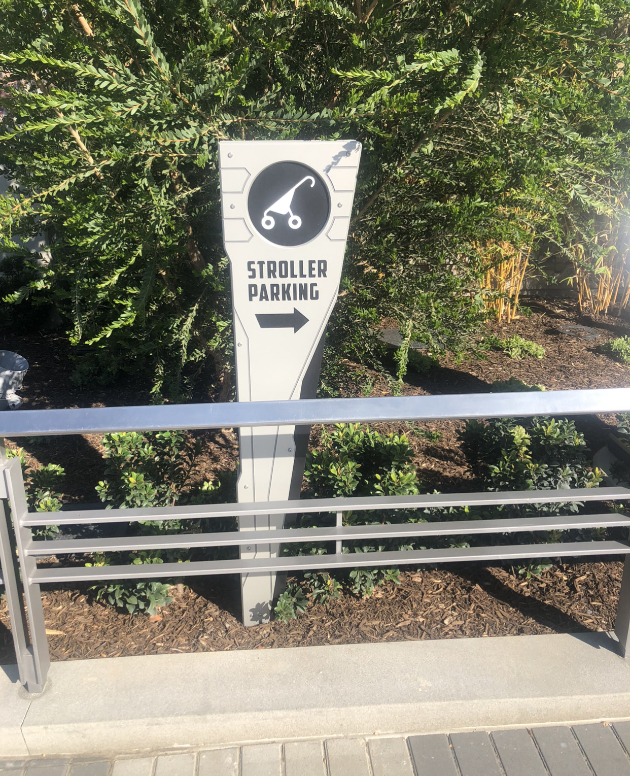 A sign reads: stroller parking