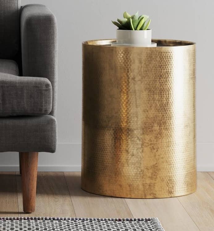 The gold modern accent table