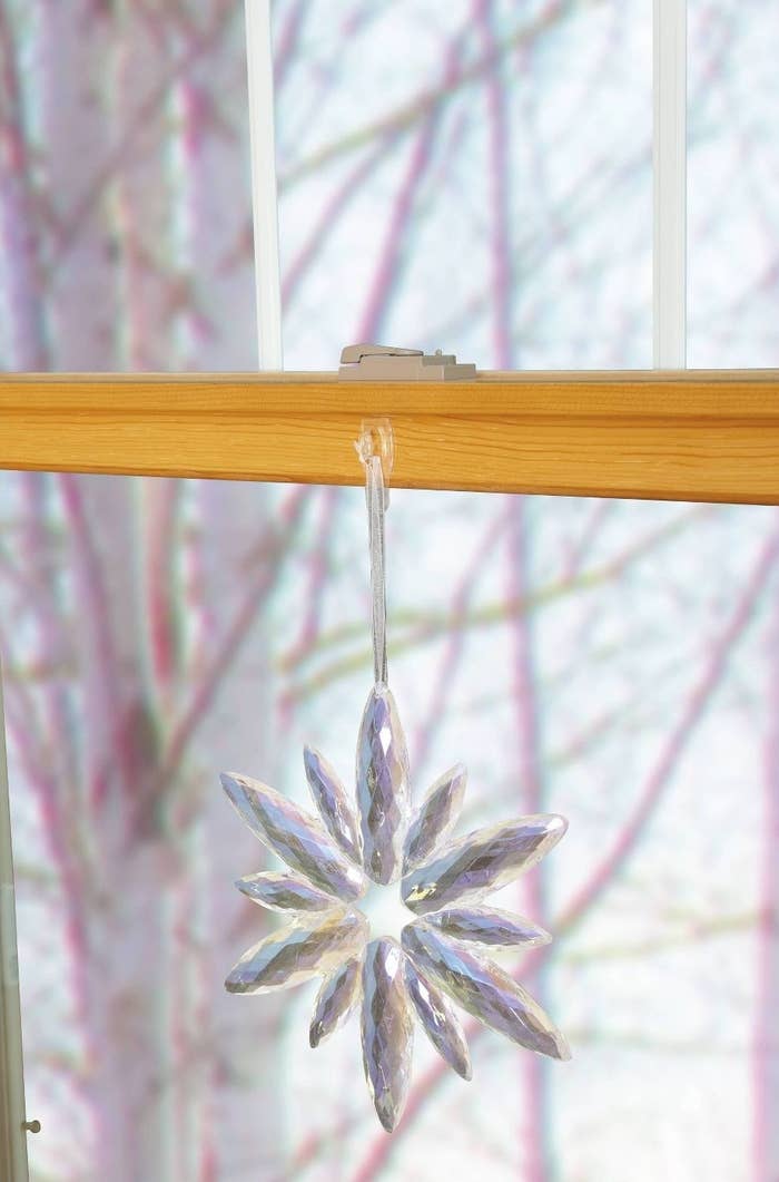 A command hook in a window holding a snowflake