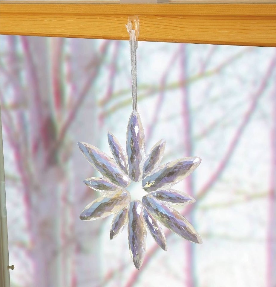 A command hook in a window holding a snowflake